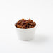 Organic Dried Sultanas (Dried Fruits) in small white bowl - Naked Foods