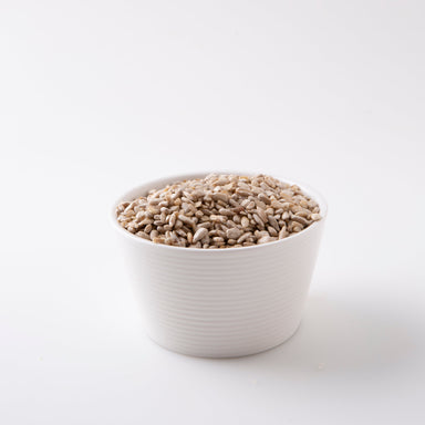 Organic Sunflower Seeds (Seeds) in white porcelain bowl - Naked Foods