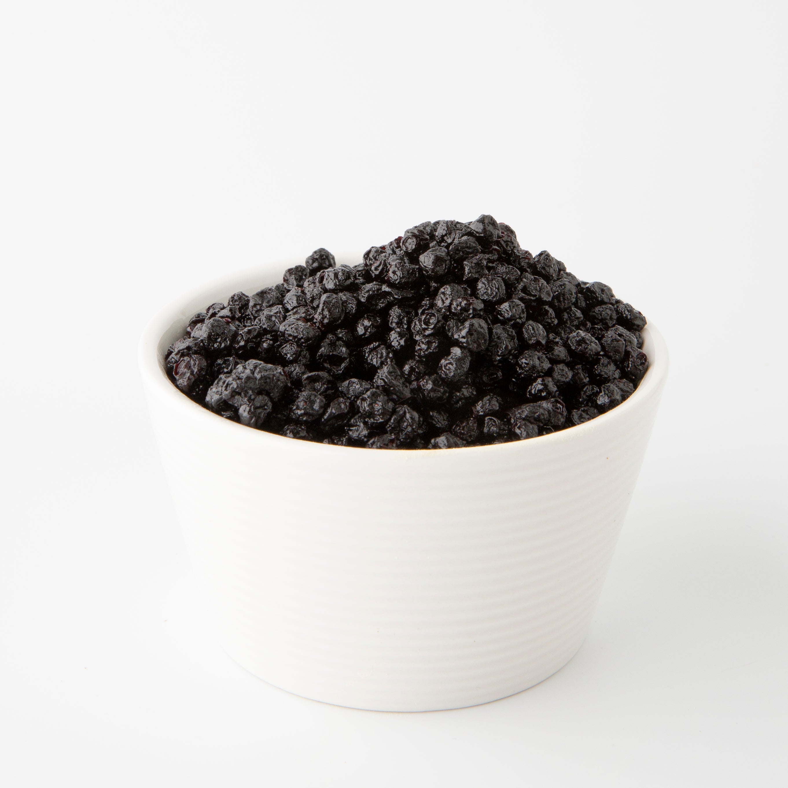 Organic Dried Blueberries (Dried Fruits) in white bowl - Naked Foods
