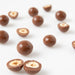 A close-up Milk Chocolate Hazelnuts (Chocolates) - Naked Foods