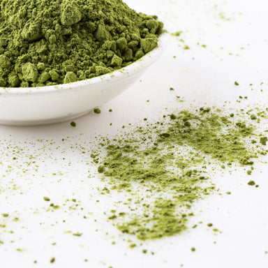 Close up photo of Organic Wheatgrass Powder (Superfoods) in a white wide bowl - Naked Foods