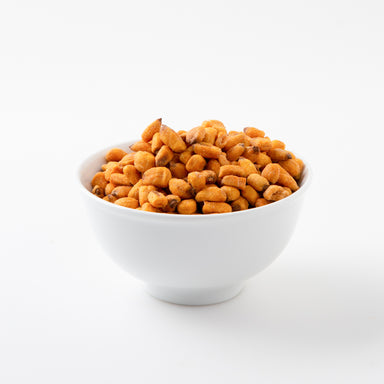 Salted Kikones (Snacks) in white bowl - Naked Foods