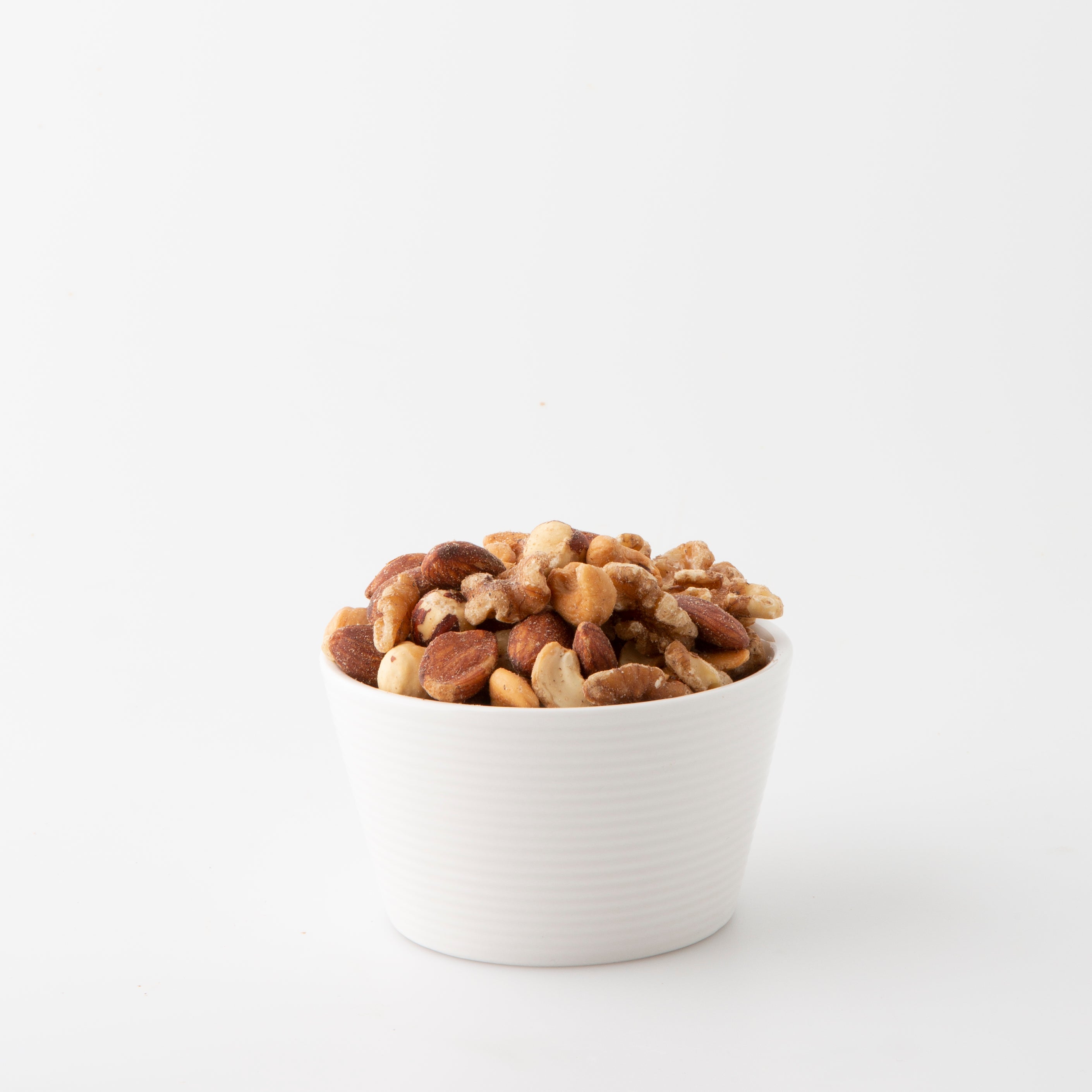 Roasted Salted Nut Mix - No Peanuts (Roasted Nuts) in white bowl - Naked Foods