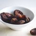 Organic Dried Apricot (Dried Fruits) served in small white bowl - Naked Foods